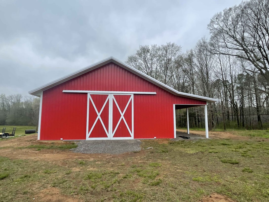 Post Frame Buildings a photo of a red barn